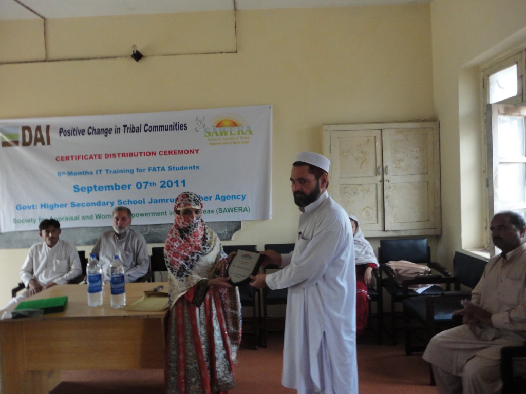 SAWERA woman receiving diploma