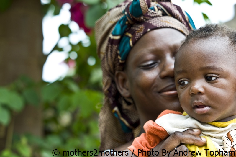 Mother holding her baby