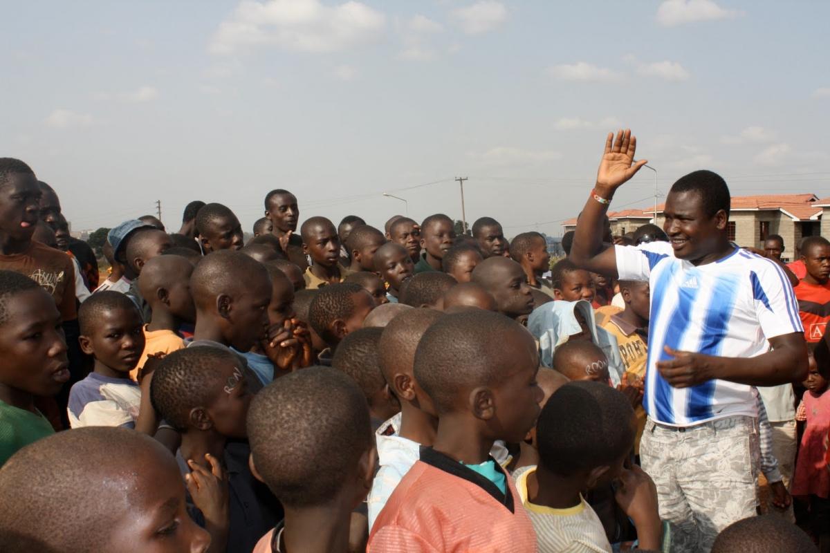 Kennedy Odede of Shining Hope for Communities leads soccer teams in Kibera