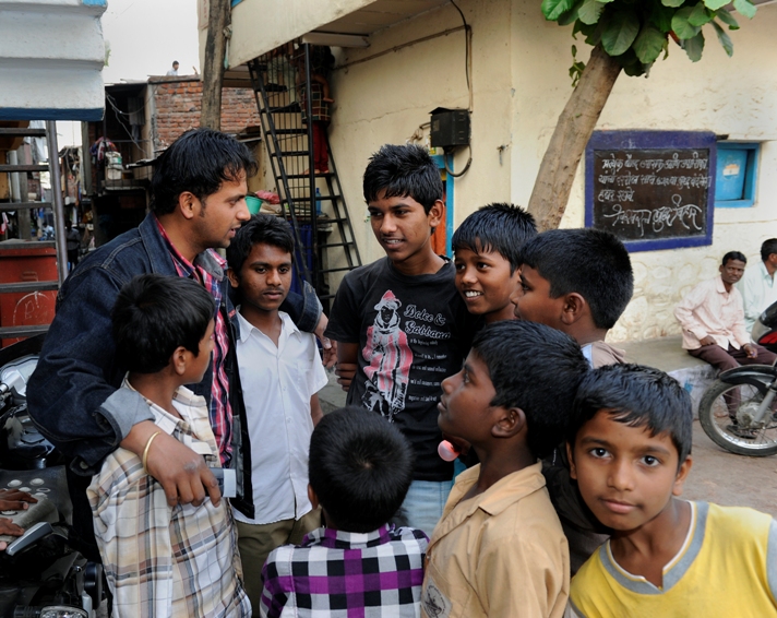 Program mentors with local boys in the community