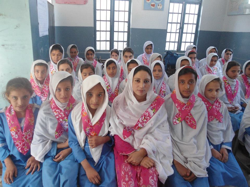 Girls and young women learn in classroom in Pakistan