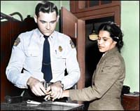 Rosa Parks is booked by police officer