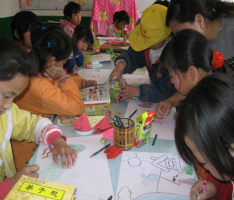 Young girls from rural China draw